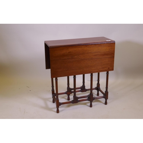 1020 - A Victorian mahogany spider gateleg table on ring turned supports, 61 x 26cm, 66cm high, 61 x 78cm e... 