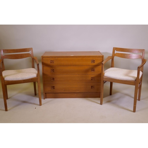 1033 - A mid century Danish teak chest of four long drawers with moulded cup handles, 87 x 40 x 66cm, and a... 