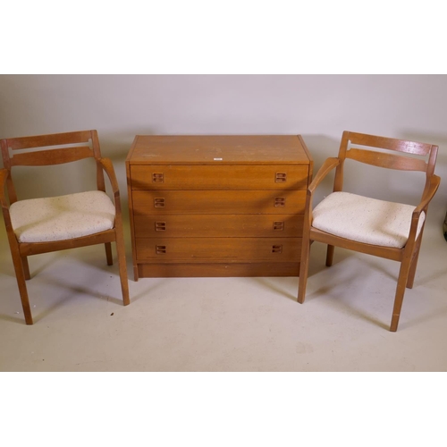 1033 - A mid century Danish teak chest of four long drawers with moulded cup handles, 87 x 40 x 66cm, and a... 