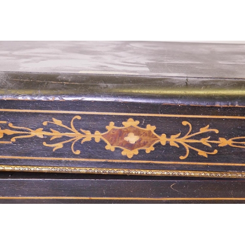 1035 - A Victorian ebonised and inlaid pier cabinet with brass mounts and single glazed door, raised on a p... 