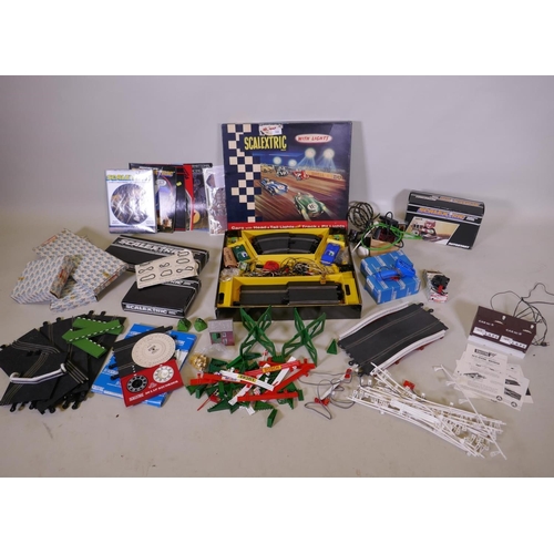 104 - A 1962 Triang Scalextric set CM34 with lights, including a Lister Jaguar C.56, and an Aston Martin C... 