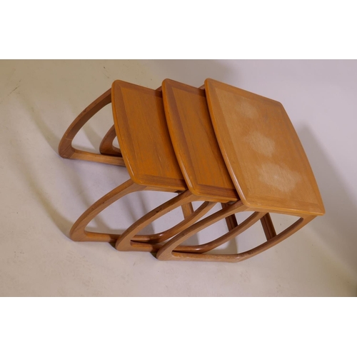 1049 - A 1970s Nathan teak nest of tables, largest 53 x 48cm, 50cm high