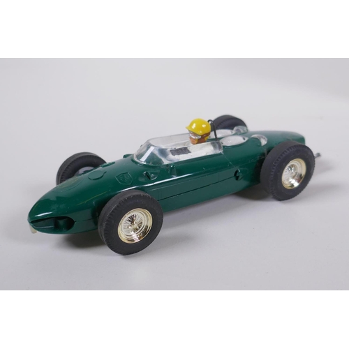 105 - Three 1960s Triang Scalextric cars to include a B.R.M. C.59, a Vanwall C.55, and a Ferrari 156 C.62,... 