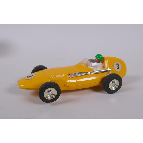 105 - Three 1960s Triang Scalextric cars to include a B.R.M. C.59, a Vanwall C.55, and a Ferrari 156 C.62,... 