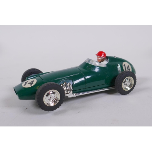 105 - Three 1960s Triang Scalextric cars to include a B.R.M. C.59, a Vanwall C.55, and a Ferrari 156 C.62,... 