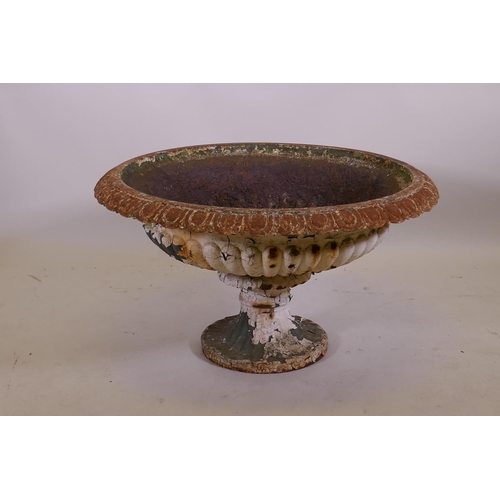 1057 - A Victorian painted cast iron campagna garden urn, 70cm diameter, 43cm high