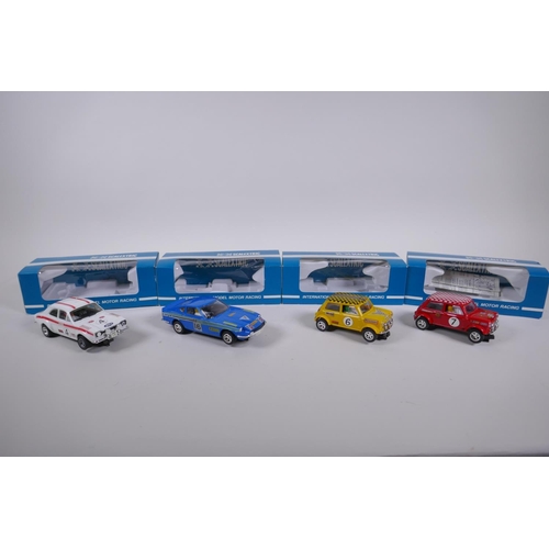 106 - Four 1970s Scalextric cars to include two Mini Cooper C.007 in red and yellow, a Datsun 260Z C.053 a... 