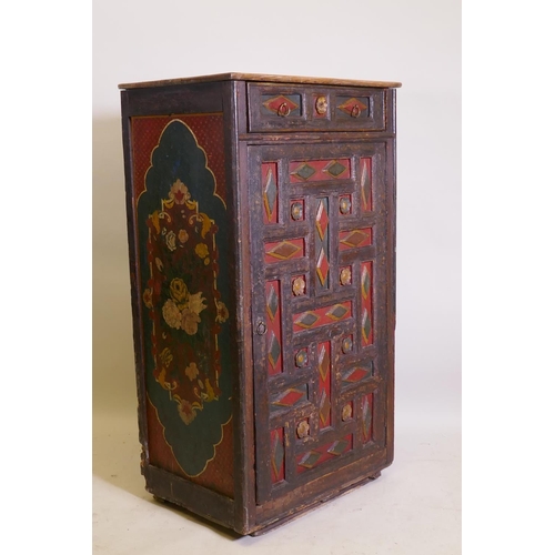 1060 - An early C19th east European painted pine cupboard, with moulded decoration, single drawer over cupb... 