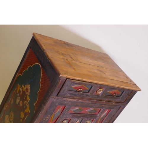 1060 - An early C19th east European painted pine cupboard, with moulded decoration, single drawer over cupb... 