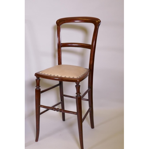 1065 - A Victorian mahogany correction chair with studded leatherette seat, a nursing chair and an Edwardia... 