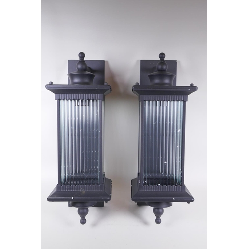 1066 - A pair of metal and glass wall lights, 20 x 24cm, 58cm high