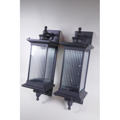 1066 - A pair of metal and glass wall lights, 20 x 24cm, 58cm high