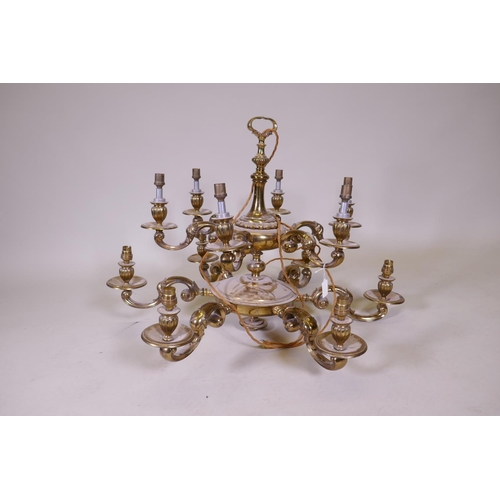 1067 - A gilt brass two tier twelve branch electrolier, 84cm diameter