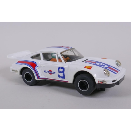 107 - Three 1970s/80s Scalextric Cars to incluede a Porsche Turbo 935 C.125, a Triumph TR7 C.130, and a Sa... 