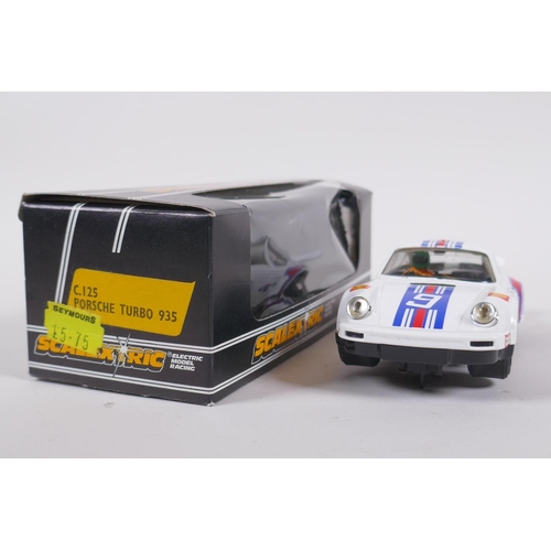 107 - Three 1970s/80s Scalextric Cars to incluede a Porsche Turbo 935 C.125, a Triumph TR7 C.130, and a Sa... 