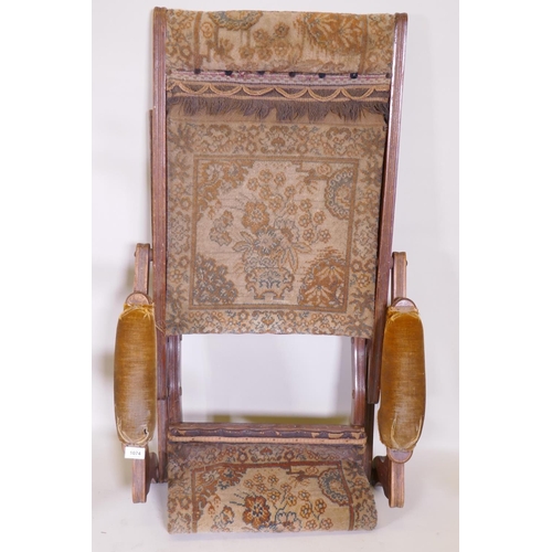 1074 - A Victorian campaign chair, The Baveystock, labelled No 6787, May 20, 1886 by Royal Letters Patent, ... 