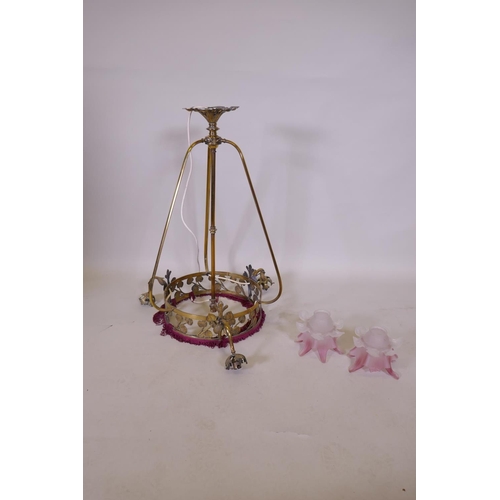 1082 - A brass pendant ceiling lamp with a tasseled fringe, lacks shades, 75cm drop, 36cm diameter