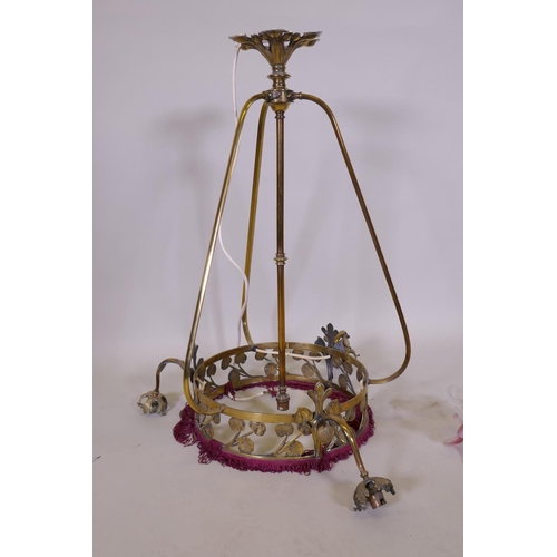 1082 - A brass pendant ceiling lamp with a tasseled fringe, lacks shades, 75cm drop, 36cm diameter