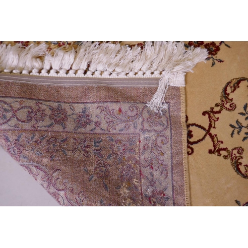 1086 - A pair of gold ground Kashmir runners with a floral medallion design, 142 x 68cm