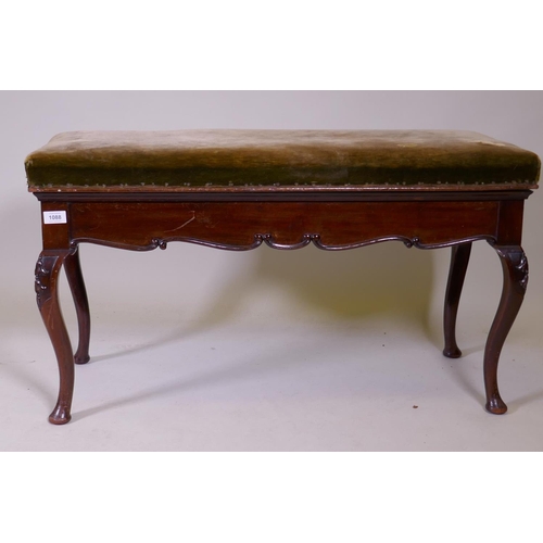 1088 - A Victorian mahogany duet stool with carved decoration, raised on cabriole supports, 93 x 40 x 50cm