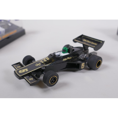 109 - Four 1970s/80s Scalextric cars, to include a Lotus 77 (JPS Livery) C.126, a March Ford 240 (Rothmans... 