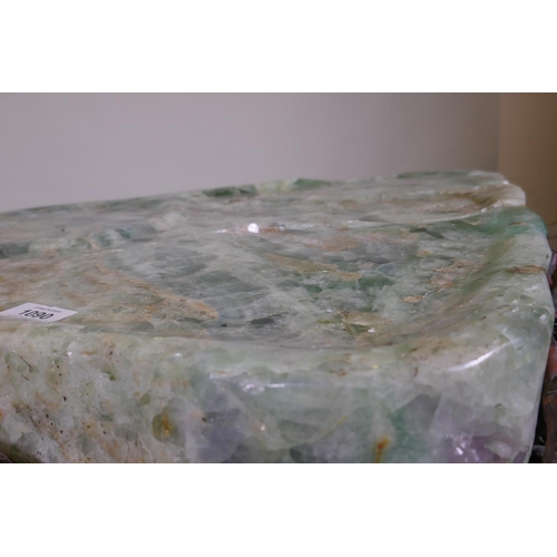 1090 - An oriental green quartz/fluorspar top table, raised on a rootwood base, AF, 80 x 65 x 56cm