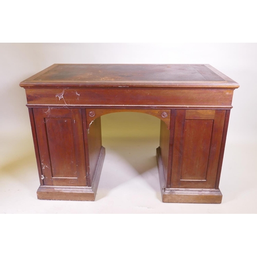 1097 - A fine quality solid walnut kneehole desk with inset gilt tooled leather top stamped Howard & So... 