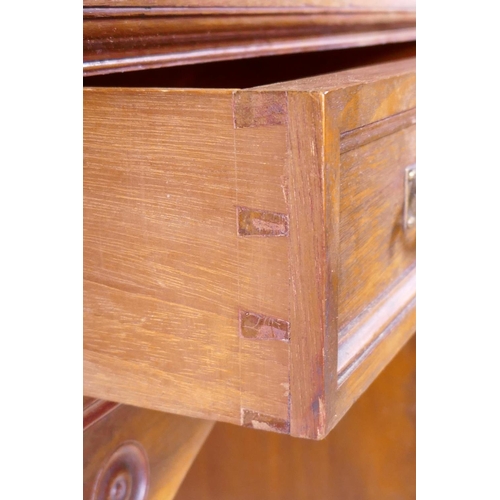 1097 - A fine quality solid walnut kneehole desk with inset gilt tooled leather top stamped Howard & So... 