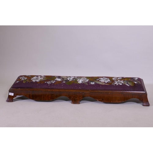 1101 - A Victorian walnut long footstool with beadwork upholstery, raised on shaped swept supports, AF, 122... 