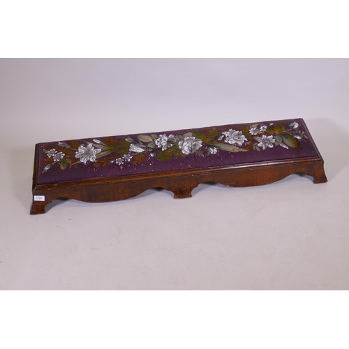 1101 - A Victorian walnut long footstool with beadwork upholstery, raised on shaped swept supports, AF, 122... 