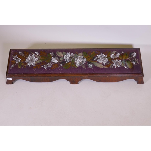 1101 - A Victorian walnut long footstool with beadwork upholstery, raised on shaped swept supports, AF, 122... 