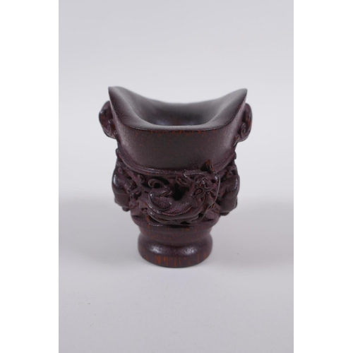 115 - A Chinese carved bamboo libation cup with climbing kylin decoration, impressed seal mark to base, 8c... 