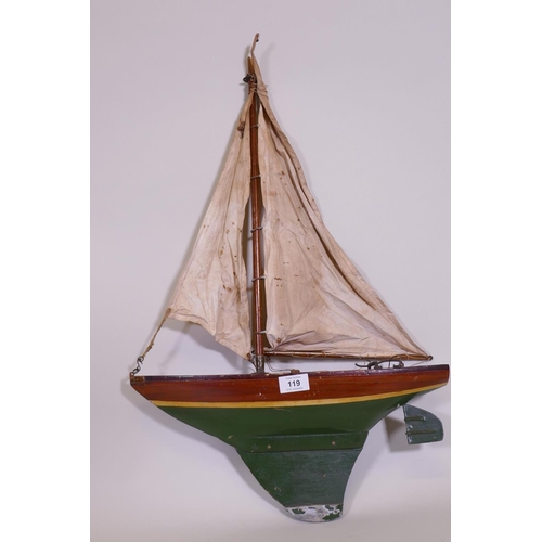 119 - An early C20th wood pond yacht, AF lacks top of mast, 44cm long