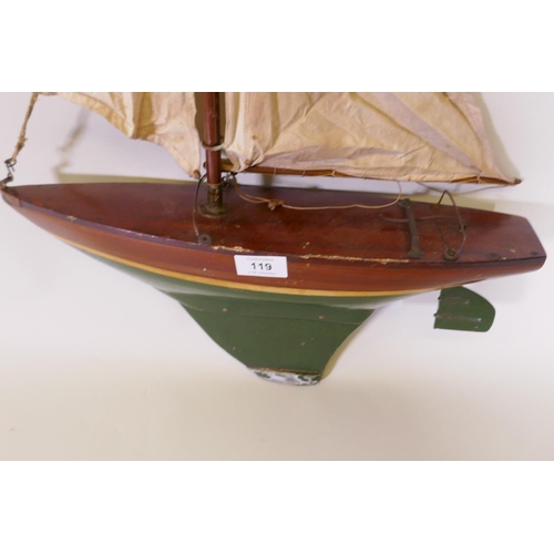 119 - An early C20th wood pond yacht, AF lacks top of mast, 44cm long