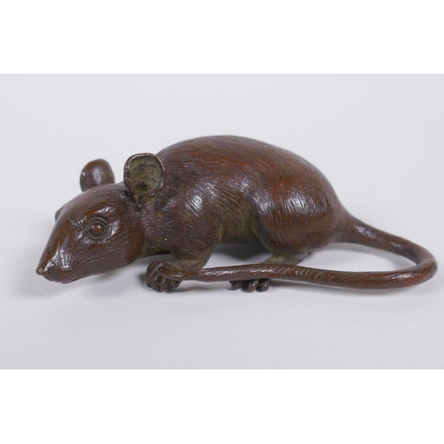 126 - A Japanese style bronze okimono rat, impressed mark to base, 9cm long