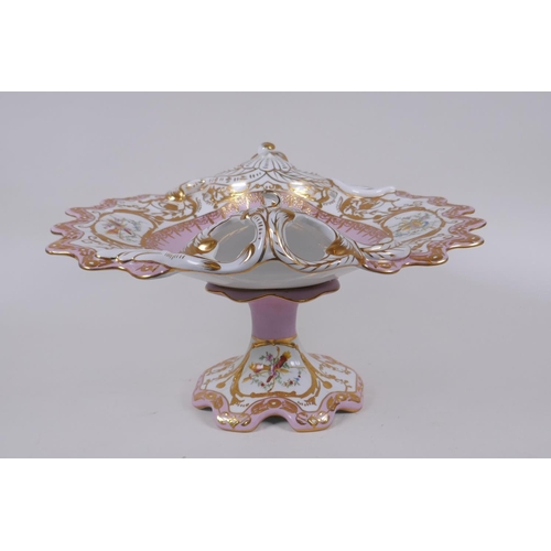 129 - A continental Sevres style porcelain centre piece with pierced handles and gilt highlights, 35 x 30c... 