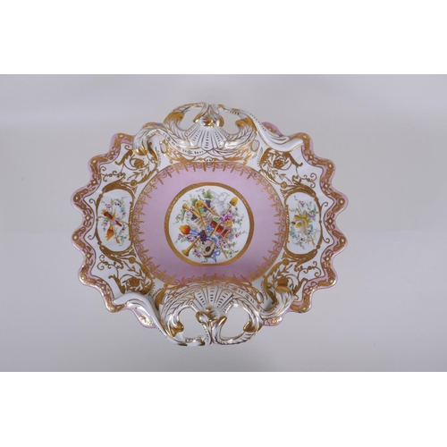 129 - A continental Sevres style porcelain centre piece with pierced handles and gilt highlights, 35 x 30c... 