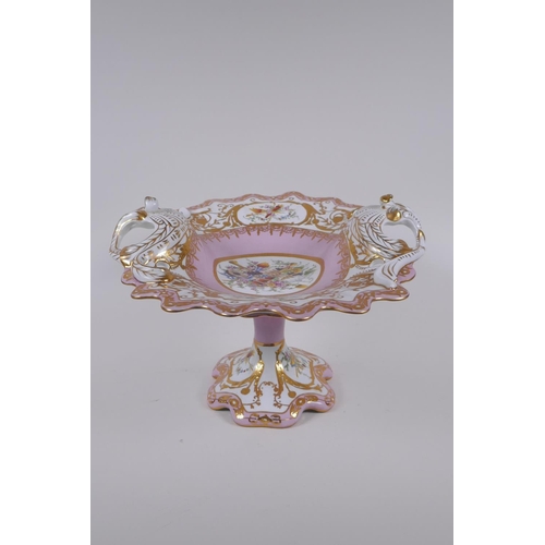 129 - A continental Sevres style porcelain centre piece with pierced handles and gilt highlights, 35 x 30c... 