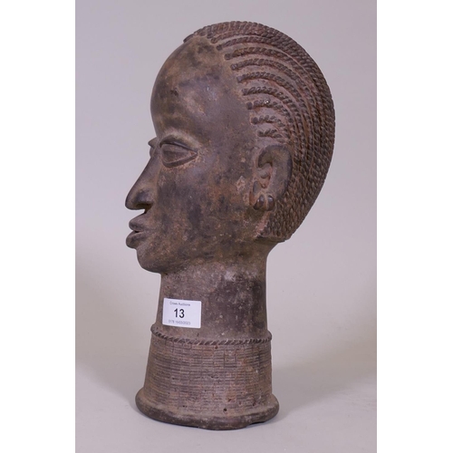 13 - An African bronze bust, head of a female with braided hair, 33cm high