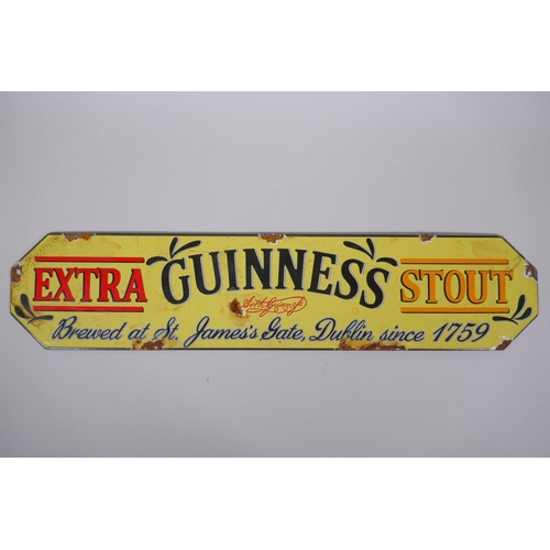 132 - A vintage style Guinness Extra Stout enamel advertising sign, 57 x 12cm