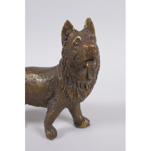 140 - A brass model of an Alsatian dog, 13cm long