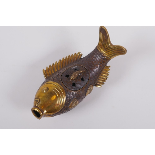 141 - A Chinese gilt bronze censer and cover in the form of a carp, 22cm long, mark to base