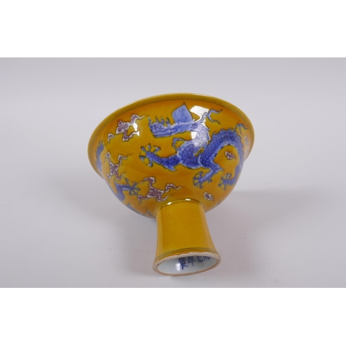 148 - A Chinese yellow ground porcelain stem bowl with blue and white dragon decoration, Chenghua 6 charac... 