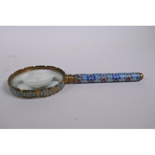 149 - An antique continental brass and cloisonne magnifying glass, 22cm long