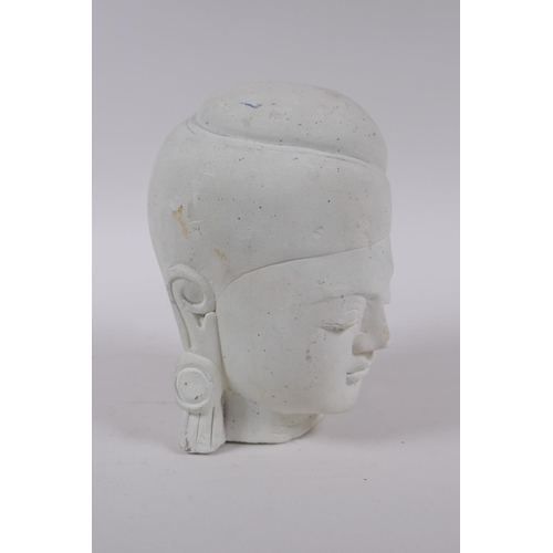 152 - An Indian plaster head bust of Buddha, 17cm high