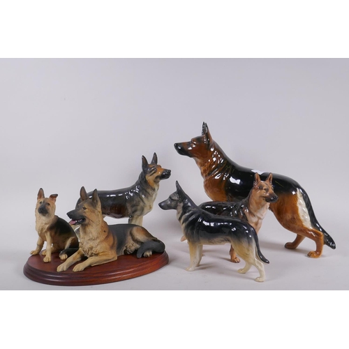 157 - Royal Doulton figure of a German Shepherd dog, two Goebel figures of the same and another, largest 2... 