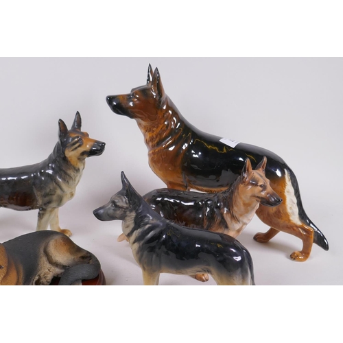 157 - Royal Doulton figure of a German Shepherd dog, two Goebel figures of the same and another, largest 2... 