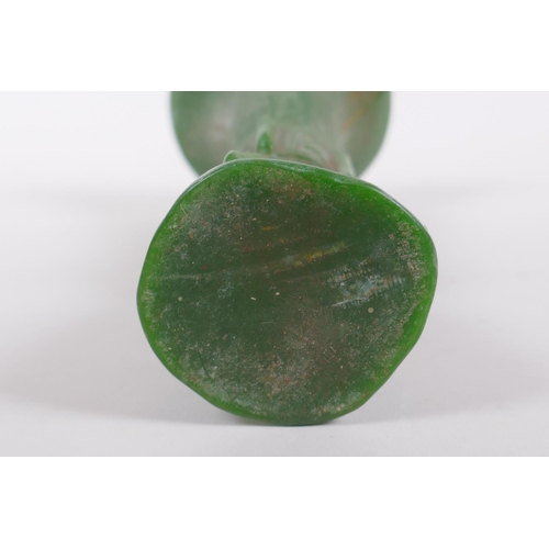 165 - A Chinese reconstituted green hardstone gu shaped vase with archaic decoration, 21cm high