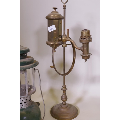 166 - An Akrom pressurised spirit lamp, a brass lamp, garden lanterns AF, and laboratory stands