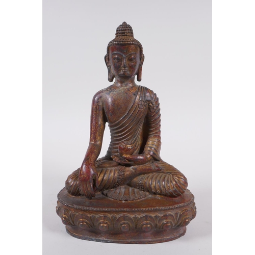 168 - A Sino Tibetan gilt bronze figure of Buddha, 20cm high